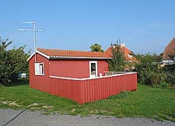 Holiday home. Built in 1962. Situated on a 50 qm site. The house is heated by electricity. 1 bathroom with shower. 1 toilet. Oven/minioven. Payphone. 2 bedrooms in all. 12 qm open terrace. ...