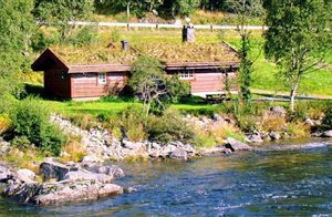  Hyggelig hytte ved ørredelven Heimstil. Aktivitetscenter: 300 m. Golf og vandreture. Fiskning fra båd i fjeldvandet. Sengetøj til leje efter aftale. ...
